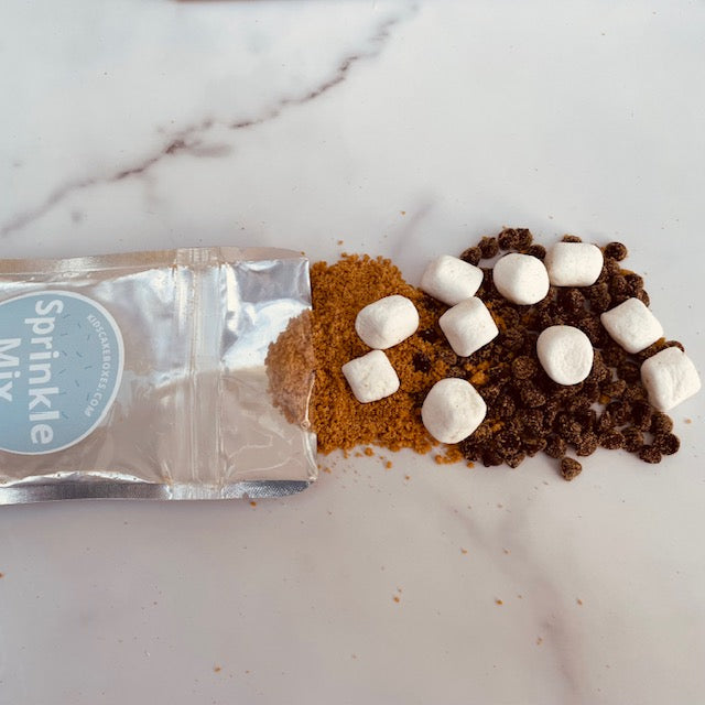 S'more themed cake baking kit, also comes as gluten free cake kit, Kids' Cake Boxes kit with gluten-free graham cracker crumbs, mini marshmallows, and vegan chocolate chips